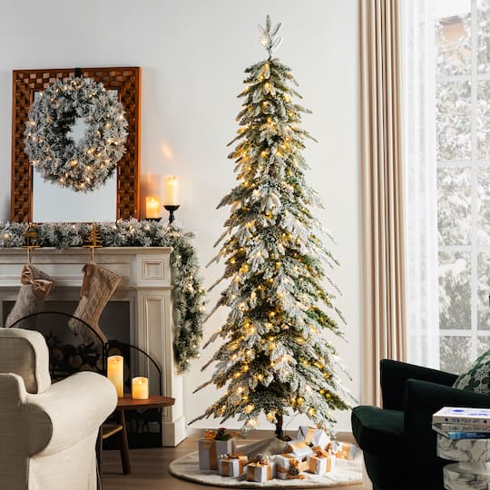 7.5ft. Pre-Lit Flocked Pencil Spruce Artificial Christmas Tree, Warm White LED Lights